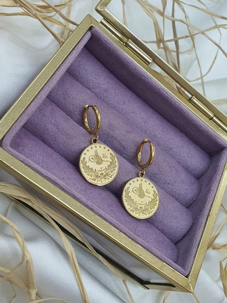 Boucle pièce pendant